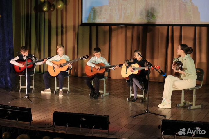 Преподаватель по гитаре