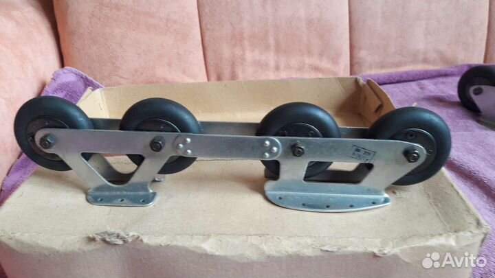 Роликовые коньки