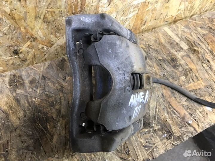 Суппорт передний правый Альмера Логан Ларгус К4М