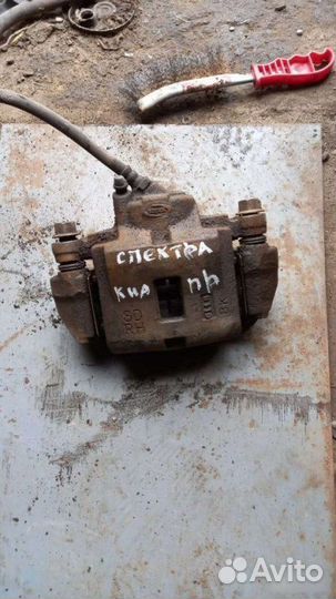 Суппорт передний правый Kia Spectra 2004-2011
