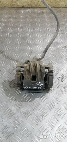 Суппорт тормозной задний левый Ssangyong Actyon