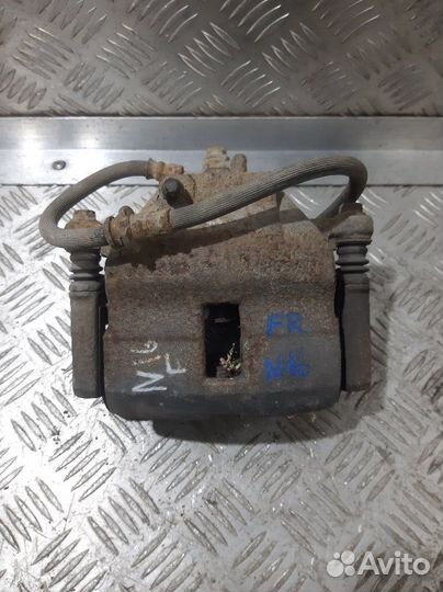 Суппорт передний правый Nissan Almera N16 QG15DE