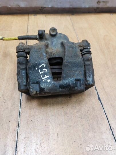 Тормозной суппорт передний правый Opel Corsa D