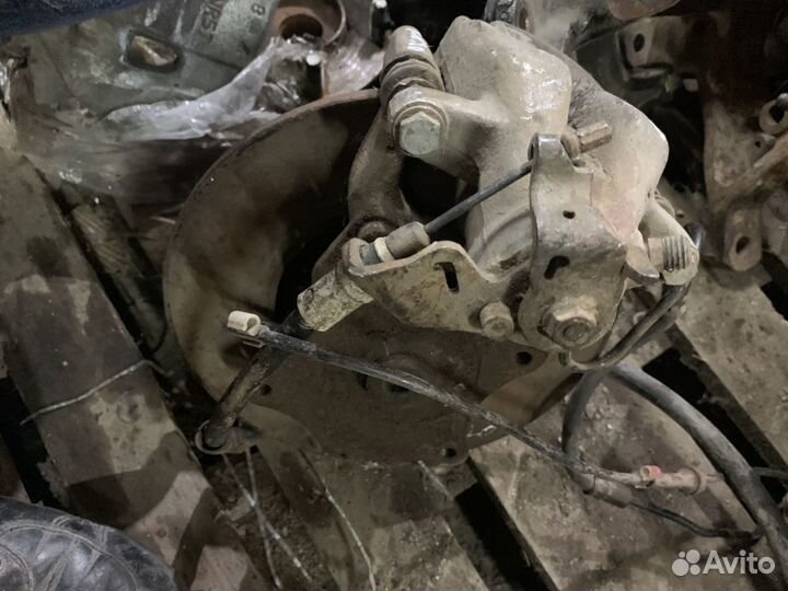 Задний суппорт Тойота Корола 120