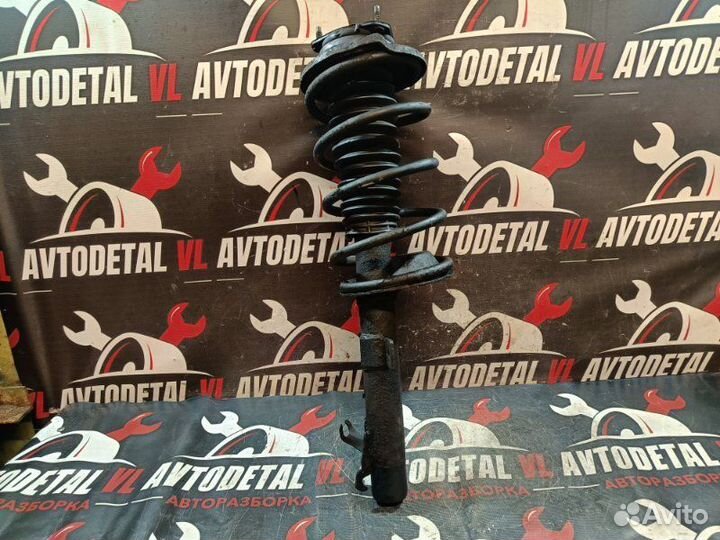 Стойка амортизатора передняя правая Ford Focus 1