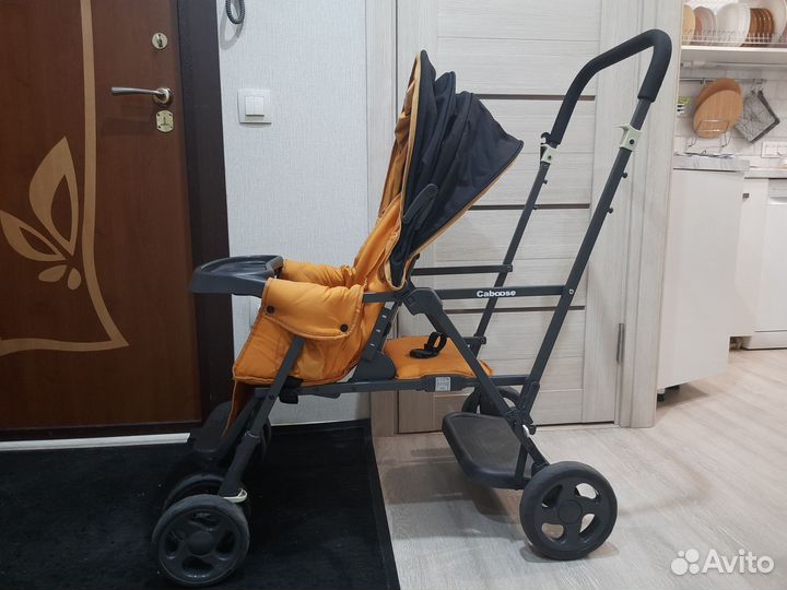Прогулочная двухместная коляска