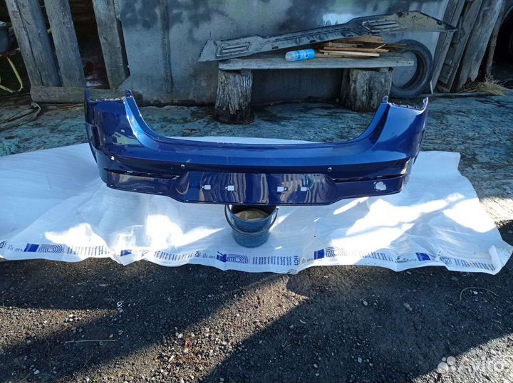 Бампер задний с юбкой KIA K5