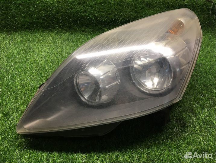Фара левая Opel Zafira B