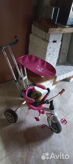 Трехколесный велосипед с ручкой б/у