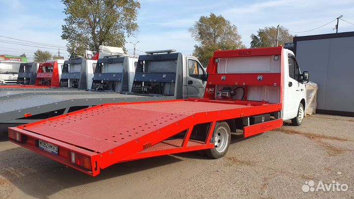 Эвакуаторная платформа ломаного типа