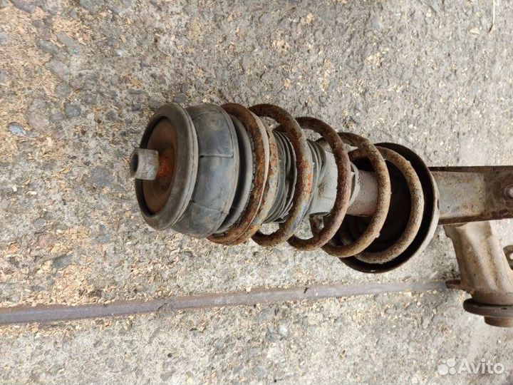 Стойка амортизатора передняя левая Opel Vectra A