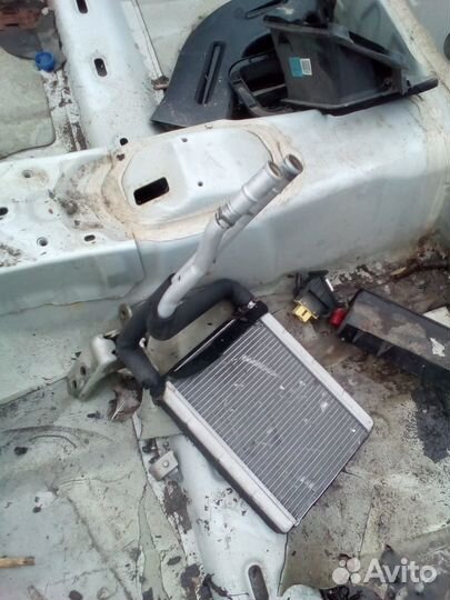 Радиатор печки на Джили Эмгранд ес 7