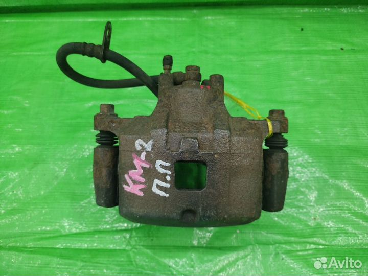 Суппорт передний правый Sportage / Tucson 04-10