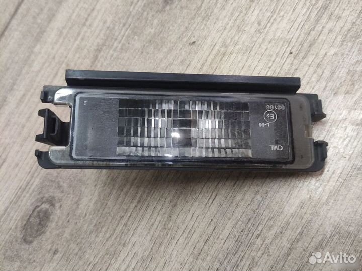 Фонарь подсветки номера Renault Sandero