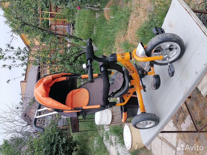 Детский трехколесный велосипед коляска