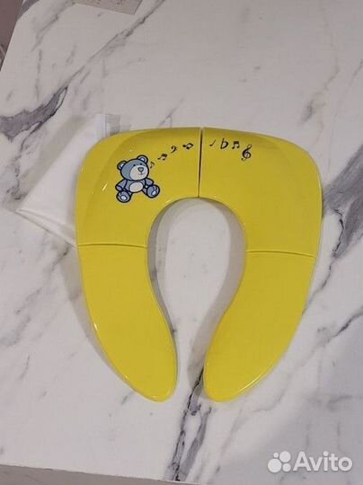 Новая накладка на унитаз детская складная, жёлтая