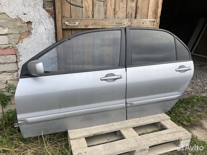 Двери левые mitsubishi lancer 9