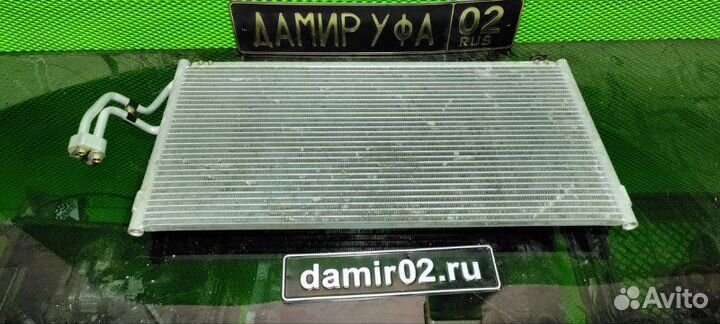 Радиатор кондиционера Mitsubishi Lancer