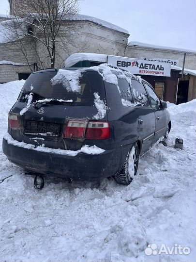 В разборе Kia Carens