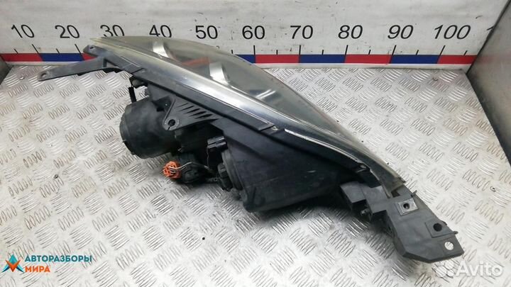 Фара левая Mazda 3 BK рест. 2008