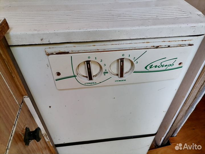 Стиральная машина с центрофугой