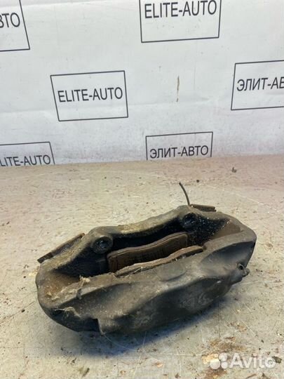 Суппорт тормозной передний левый Lr Range Rover