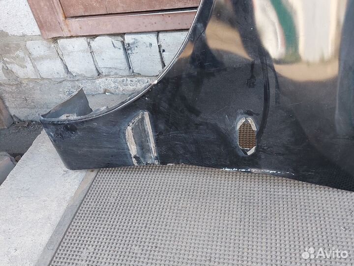 Митсубиси Лансер 9 крыло переднее левое MN150625