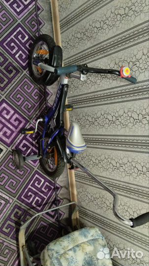 Детский велосипед с родительской ручкой