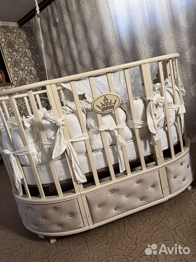 Детская кроватка трансформер с маятником