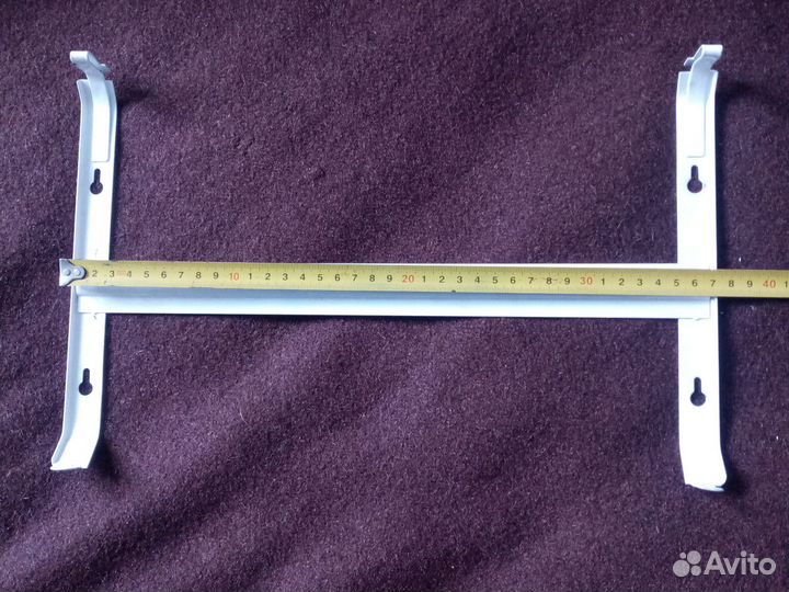 Крепление конвекторного обогревателя