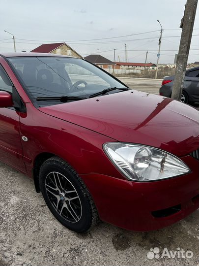 Mitsubishi Lancer 1.6 AT, 2006, 170 000 км