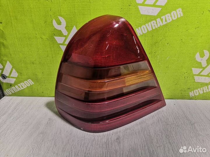 Фонарь задний левый Мерседес Бенз 202 93-00