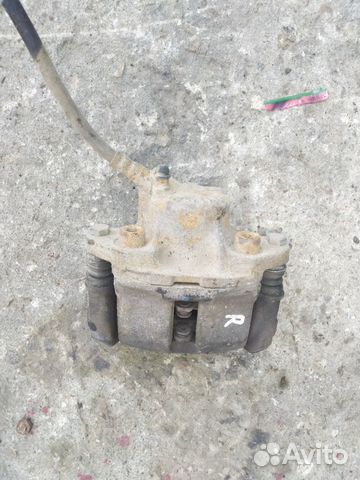 Тормозной суппорт передний правый Renault Logan