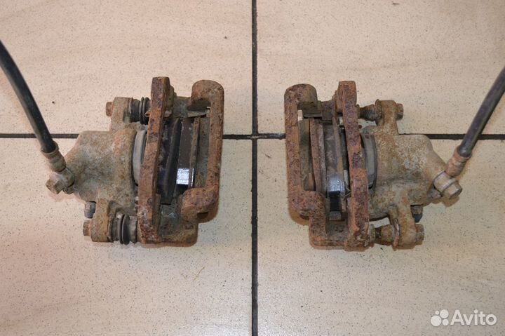 Chery IndiS (S18D) Тормозной суппорт задний