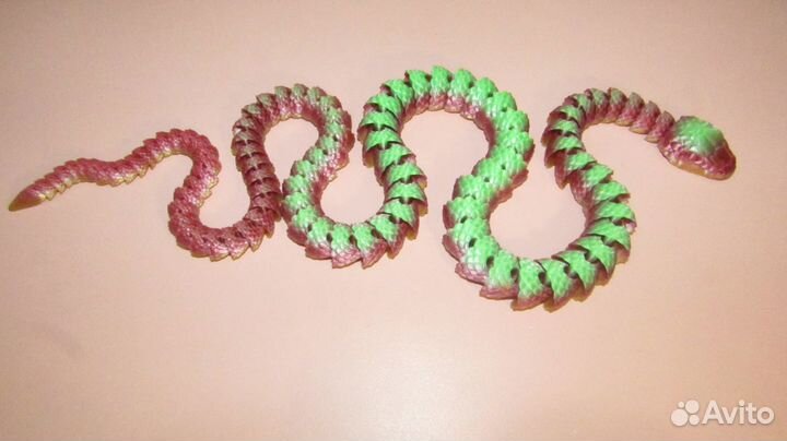 Подвижная игрушка змеика