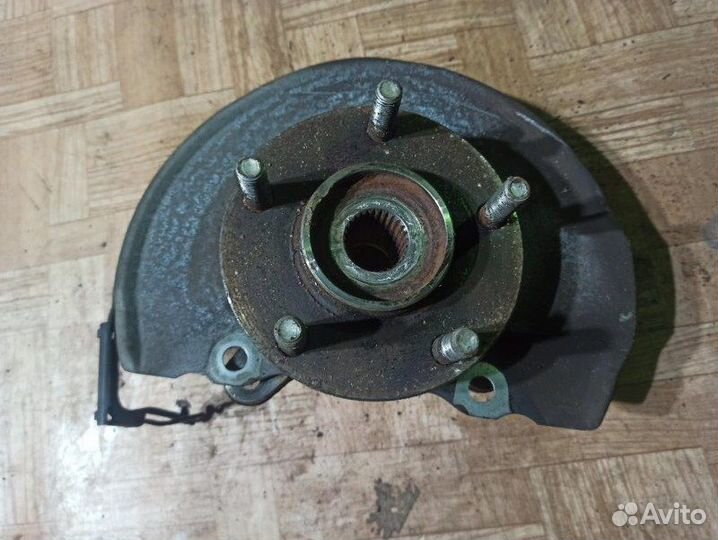 Поворотный кулак левый Mitsubishi Lancer 10 2007