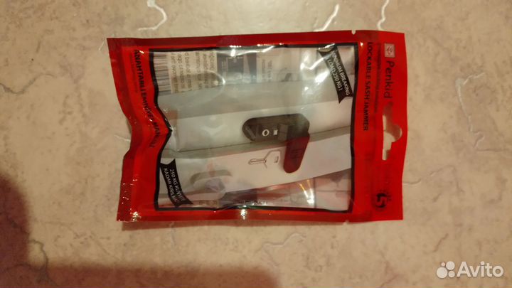 Замок глушитель окон,и защёлки балконной двери