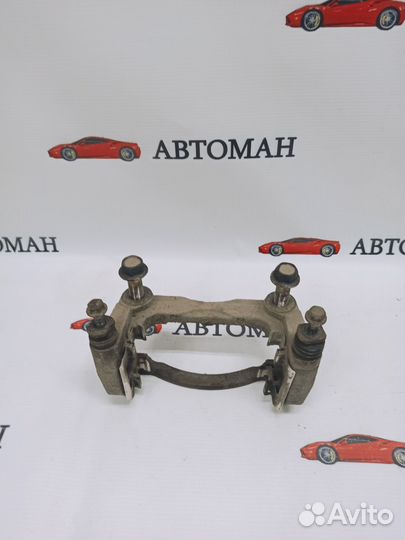 Скоба суппорта переднего Nissan Qashqai (J10)