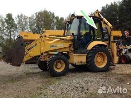 Стекло кузовное заднее левое Komatsu WB97R-5