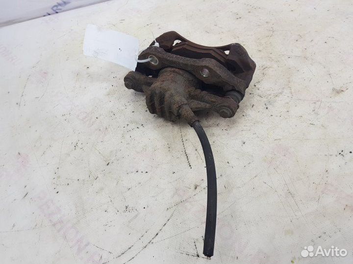 Суппорт тормозной передний левый Peugeot 206