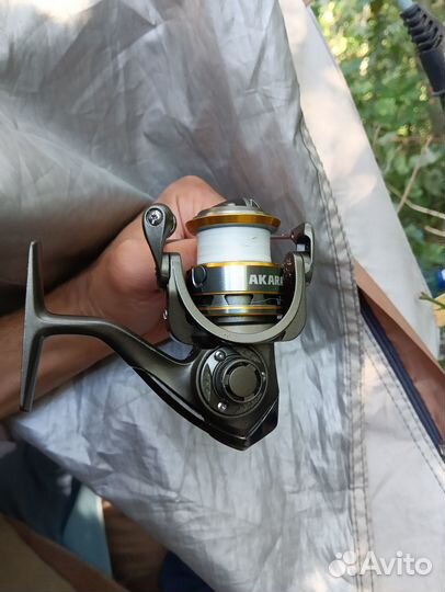 Катушка спининга akara