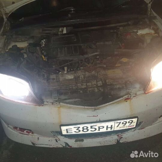 Мазда демио