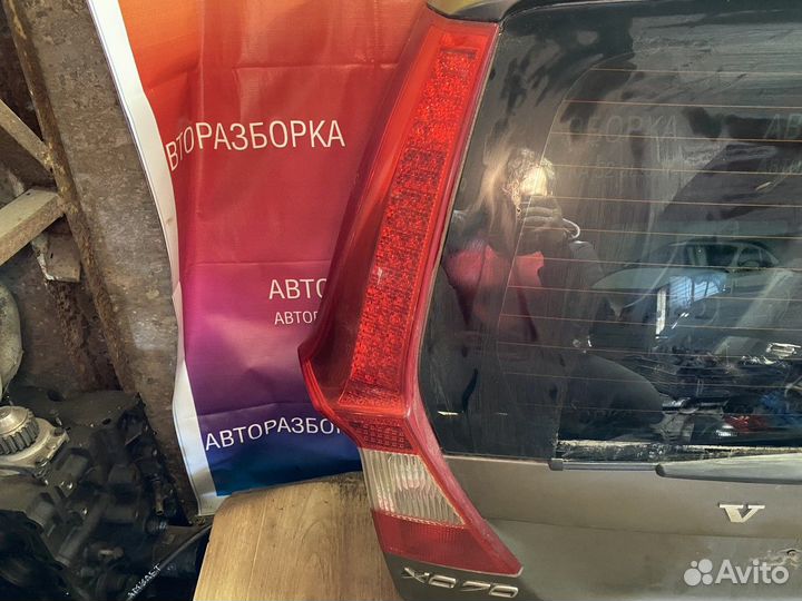 Фонарь задний левый в крышку багажника Вольво хс70