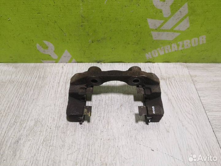 Скоба суппорта переднего Шевроле Ланос