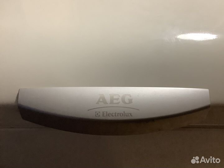 Стиральная машина с вертикальной загрузкой аег