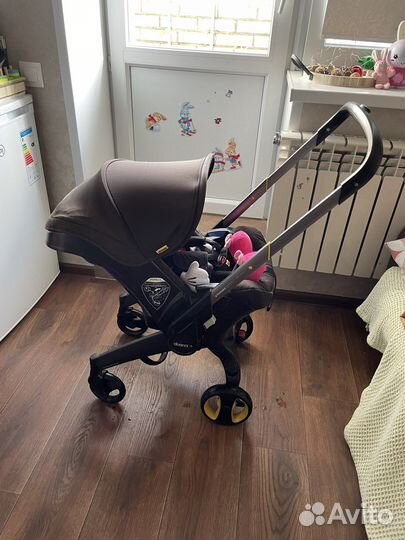 Детская коляска автолюлька doona plus