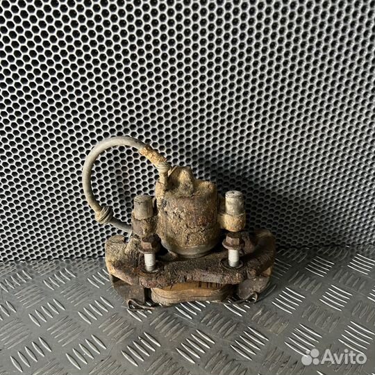 Суппорт тормозной передний левый Ford Focus