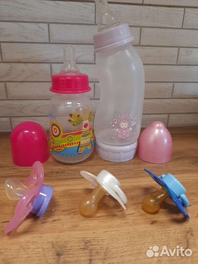 Бутылочки и пустышки