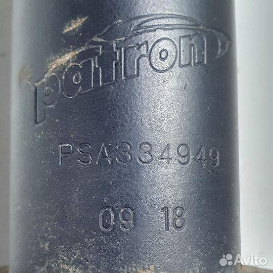 Амортизатор передний левый Opel Astra G