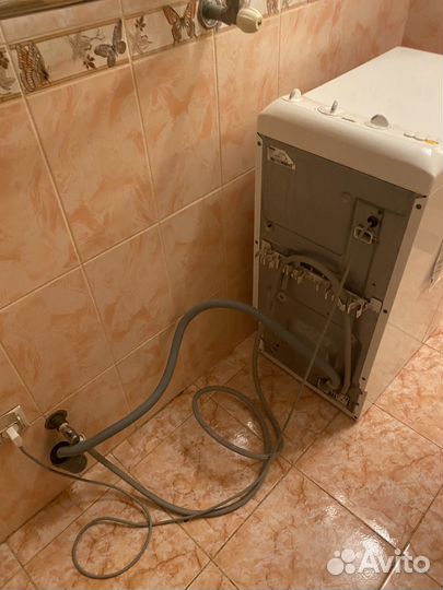 Стиральная машинка с вертикальной загрузкой